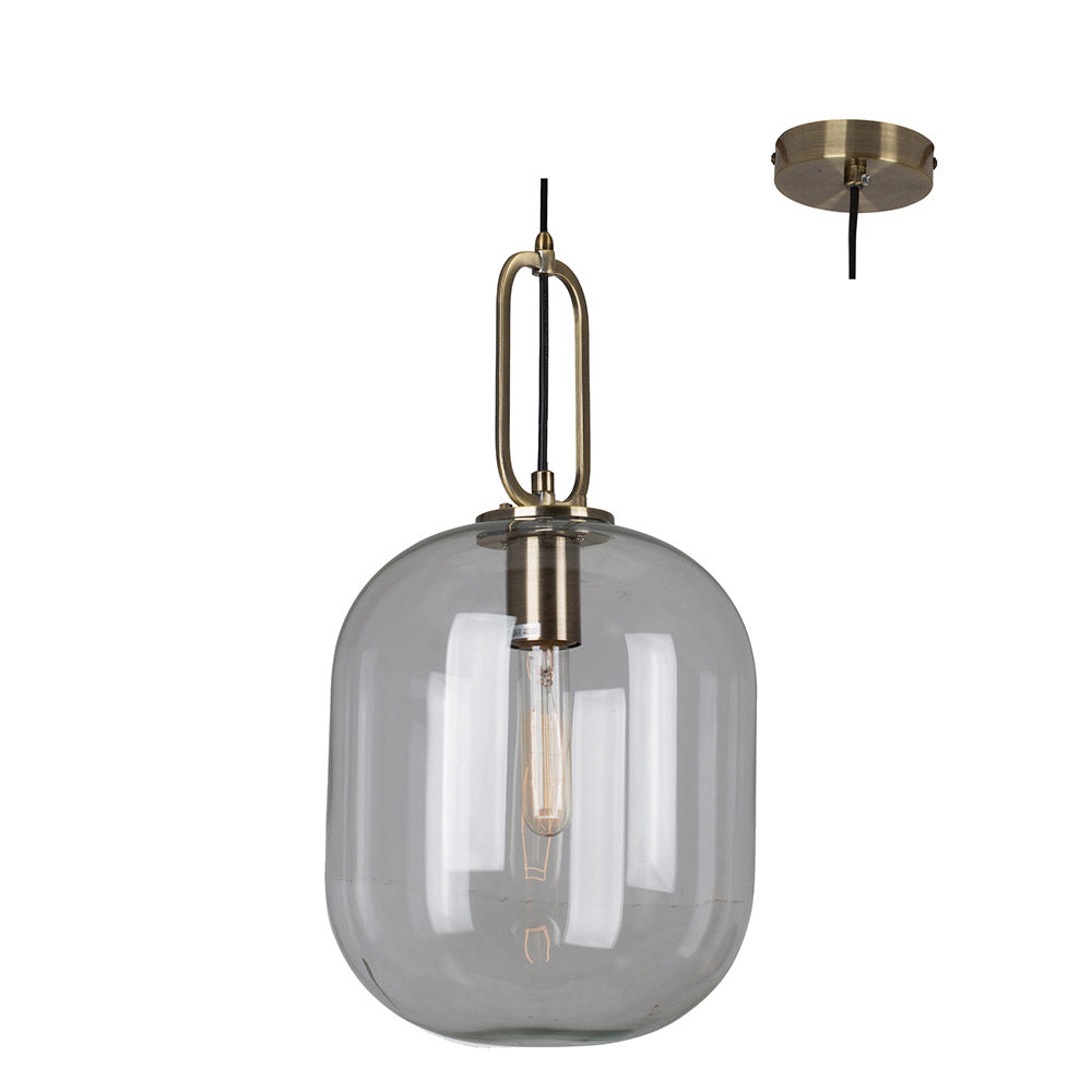 Pendant light with smoked glass shade and brass fixture on a white background