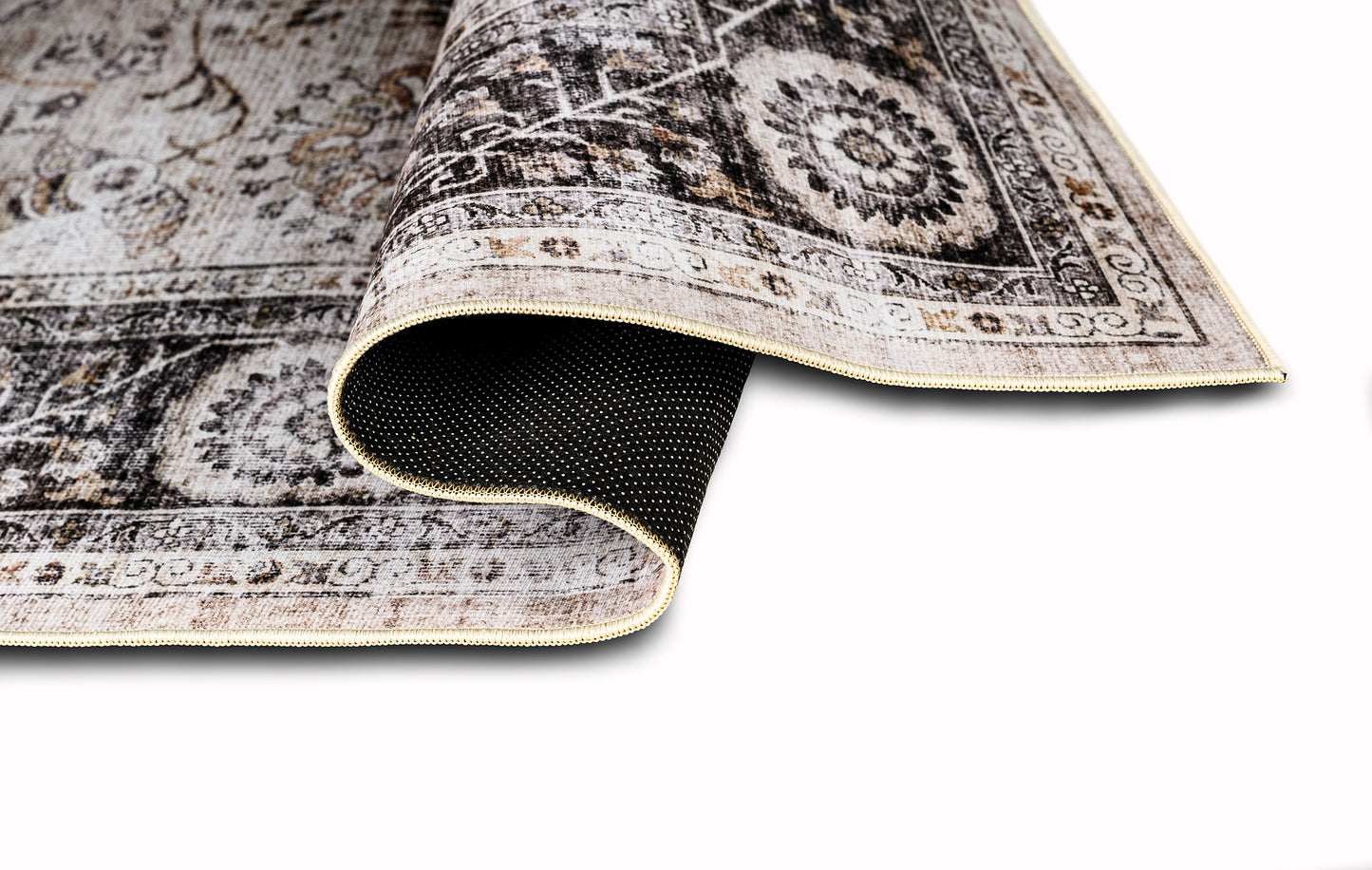 Patterned rug with a textured back on a white background