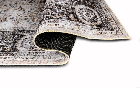 Patterned rug with a textured back on a white background