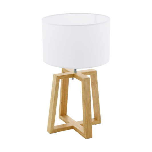 Table lamp with wooden base and white shade on a white background