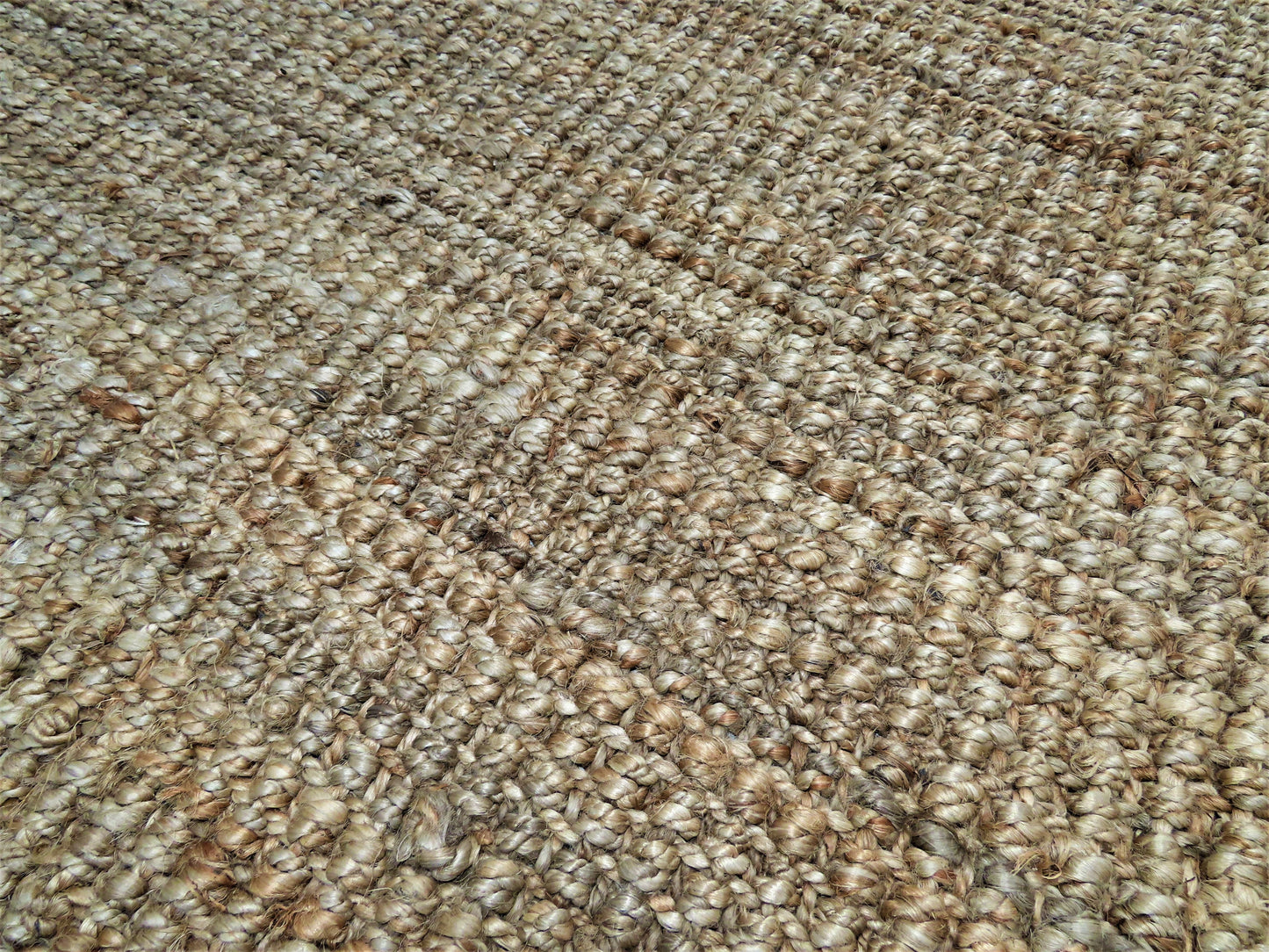 Close-up of beige carpet texture