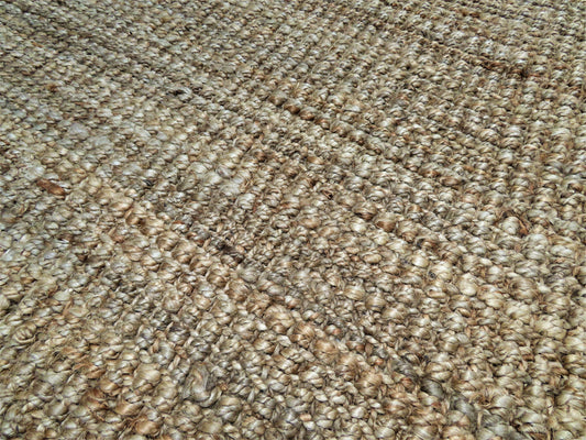 Close-up of beige carpet texture